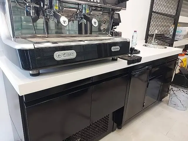 Cafe bar: Refrigerated counter with espresso machine