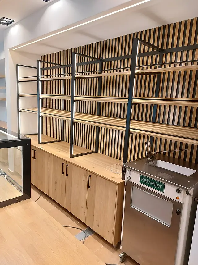Bakery: Bread display shelving with metal frame and LED lighting