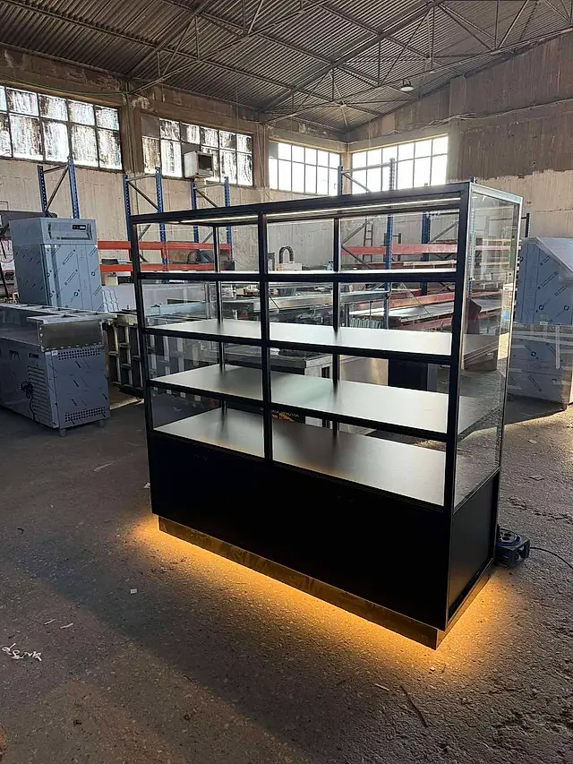 Patisserie: Pastry display case with LED accent lighting