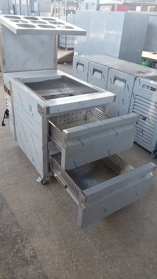 Production: Stainless refrigerated counter with drawers
