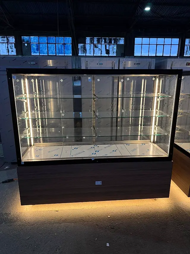 Product: Refrigerated pastry display case with glass shelves