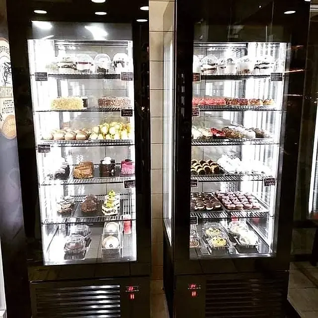 Patisserie: Upright illuminated pastry displays