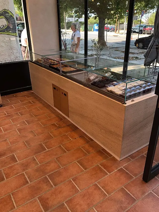 Patisserie: Stone clad display counter
