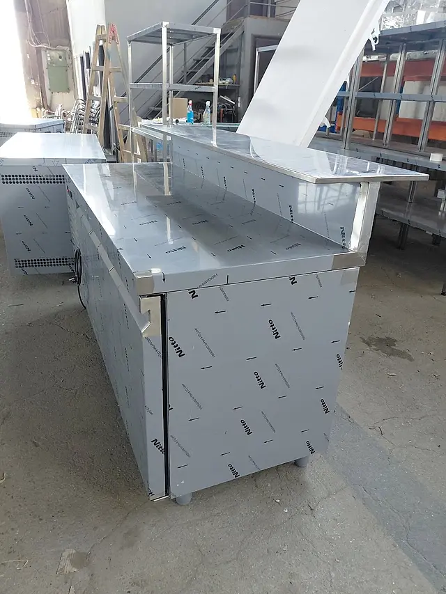 Production: Stainless steel counter with serving shelf