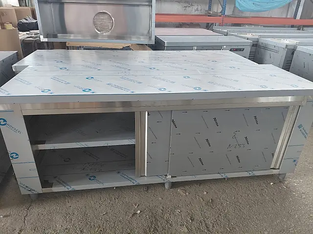 Production: Stainless steel cabinet with sliding doors